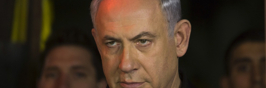 Israeli Prime Minister Benjamin Netanyahu visits the scene of a shooting incident in Tel Aviv, Israel January 2, 2016. A gunman identified by relatives as a member of Israel's Arab minority killed two people on a bustling thoroughfare in central Tel Aviv on Friday before fleeing, an incident that ramped up tensions after three months of Palestinian street violence. REUTERS/Heidi Levine/Pool - RTX20TLY